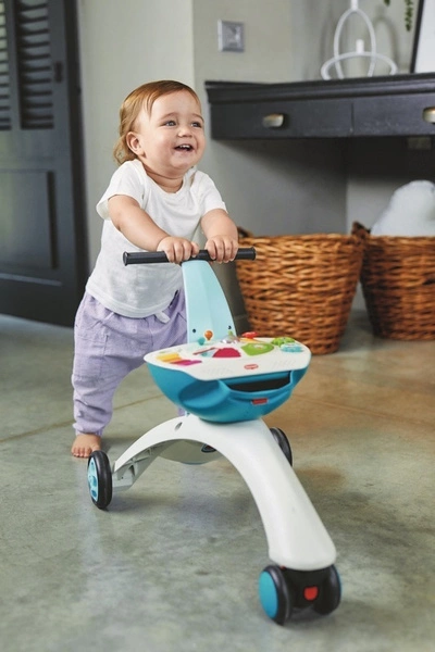 TINY LOVE JEŹDZIK PCHACZ DO NAUKI CHODZENIA GRAJĄCY ŚWIECĄCY - Niebieski