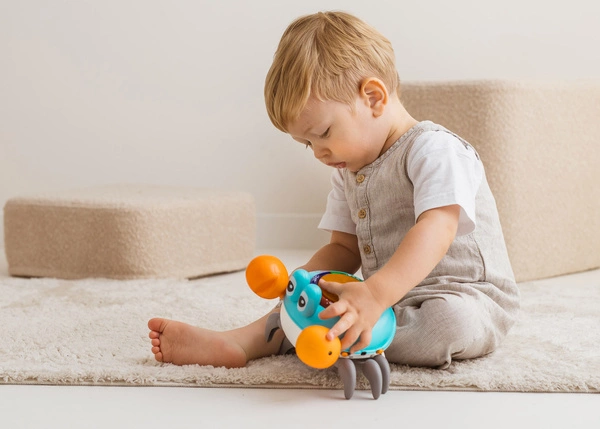 DUMEL zabawka interaktywna Krab Mądrala porusza się uczy literek cyferek PL