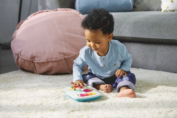 TINY LOVE JEŹDZIK PCHACZ DO NAUKI CHODZENIA GRAJĄCY ŚWIECĄCY - Niebieski